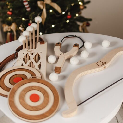 A white table topped with a christmas tree